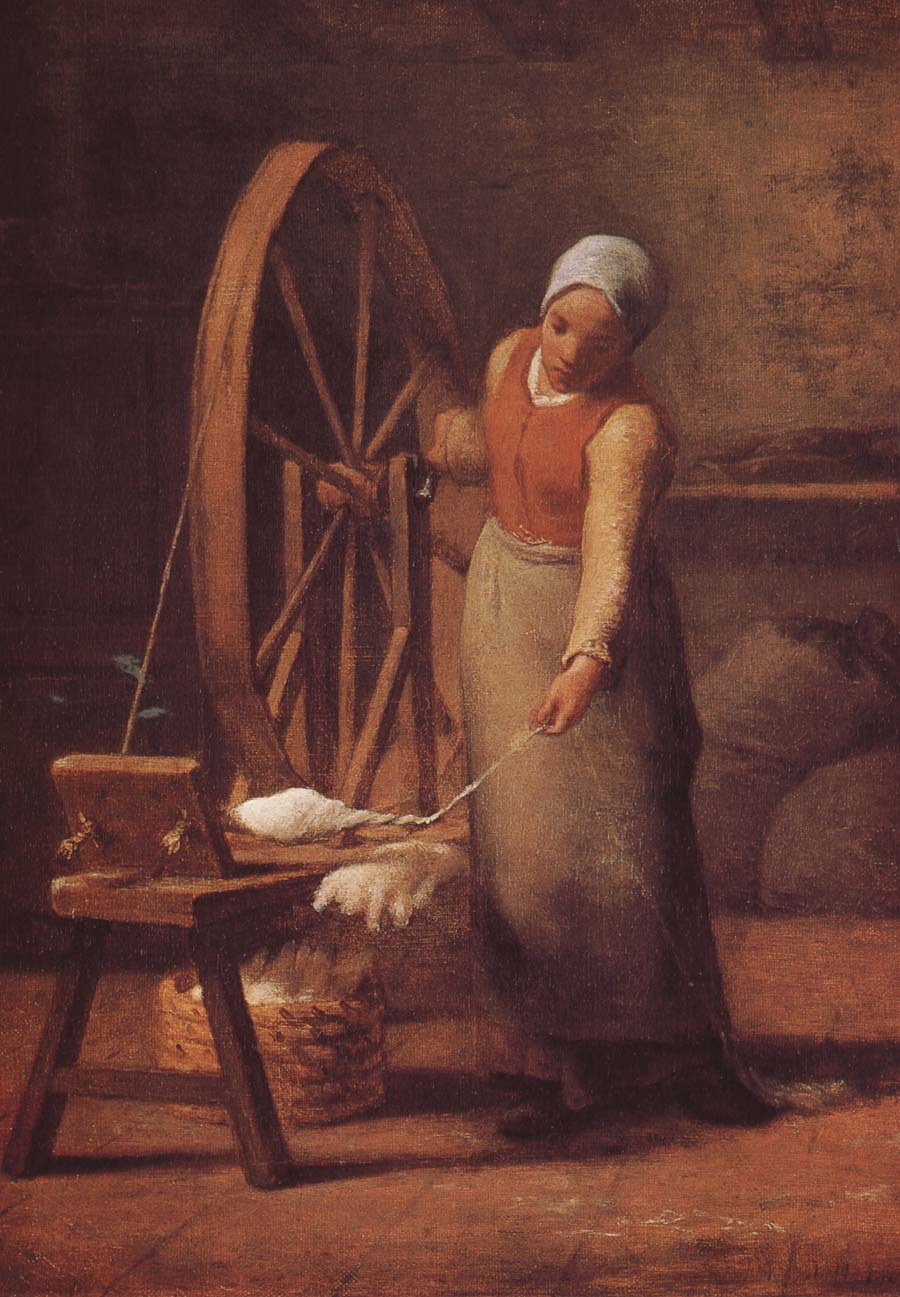 The woman weaving the sweater